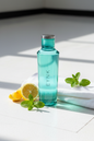 EYNK Water Bottle lifestyle photo with lemon slices and mint on gym surface